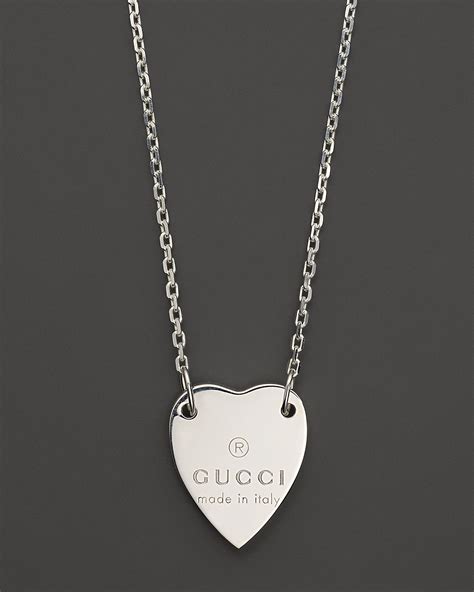 gucci heart trademark necklace|Gucci heart bracelet with trademark.